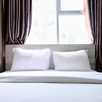 Homey And Cozy 2Br At Jarrdin Cihampelas Apartment By Travelio