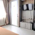 Homey And Cozy 2Br At Jarrdin Cihampelas Apartment By Travelio