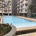 Homey And Cozy 2Br At Jarrdin Cihampelas Apartment By Travelio