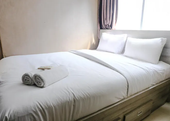 Homey And Cozy 2Br At Jarrdin Cihampelas Apartment By Travelio